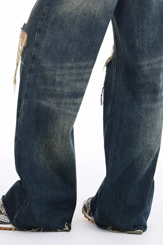 Distressed Wide-Leg Denim Jeans with Raw Hems