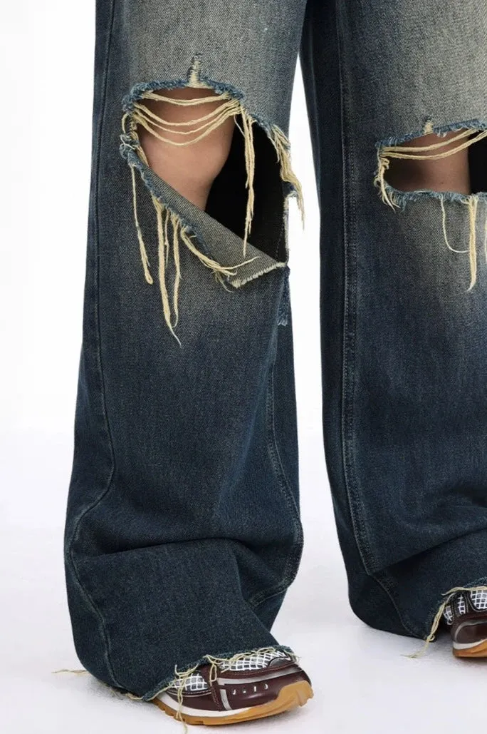 Distressed Wide-Leg Denim Jeans with Raw Hems