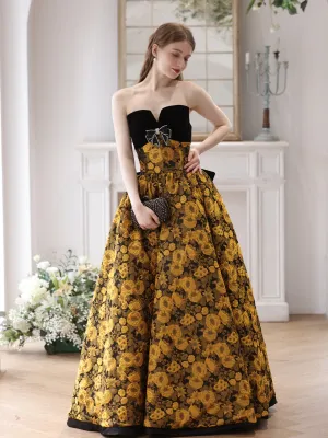 Elegant Black and Gold Floral Strapless Ball Gown with Bow Accent