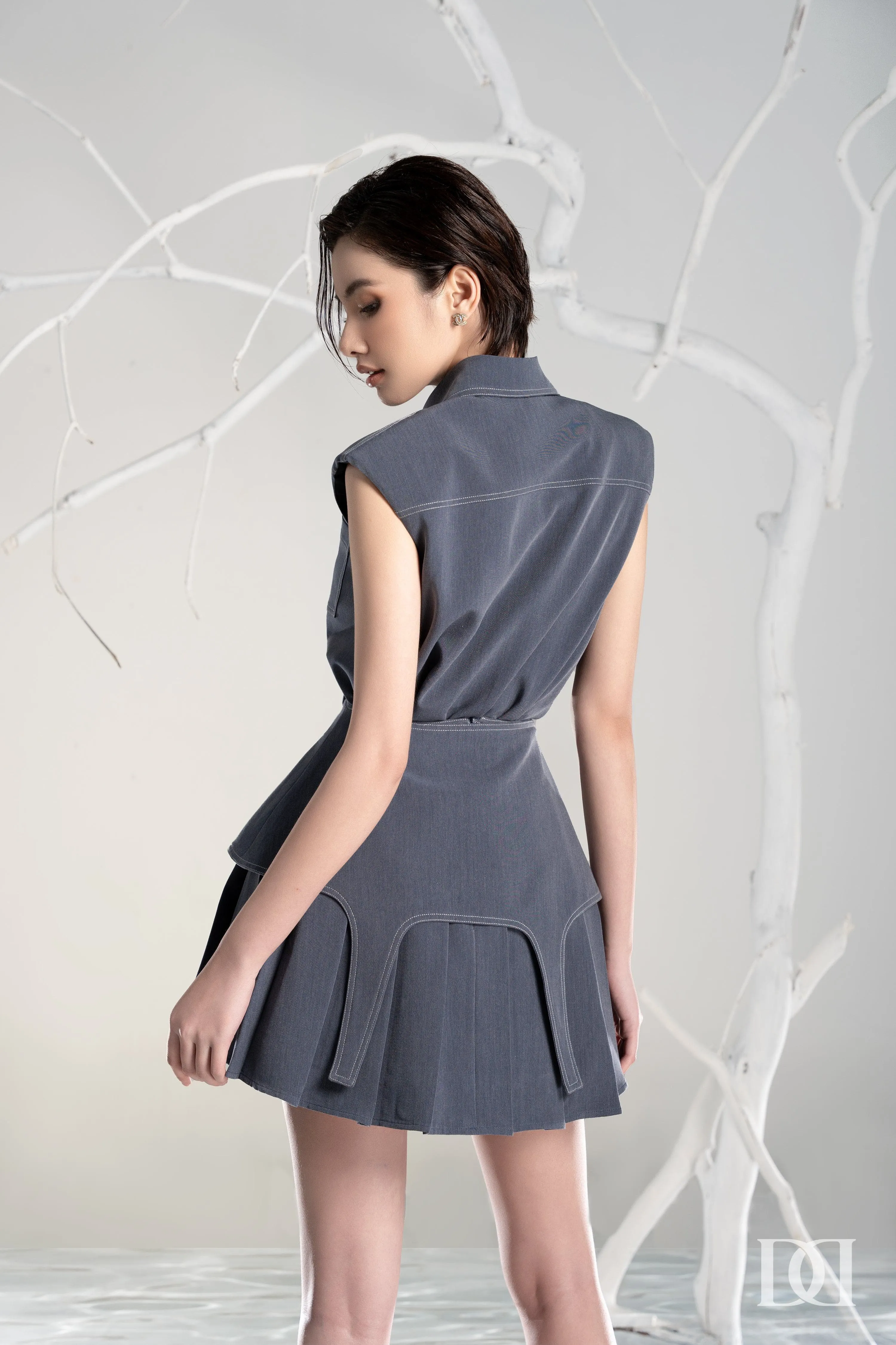 Leah Sleeveless Shoulder Padding Top & Peplum Pleated Skirt