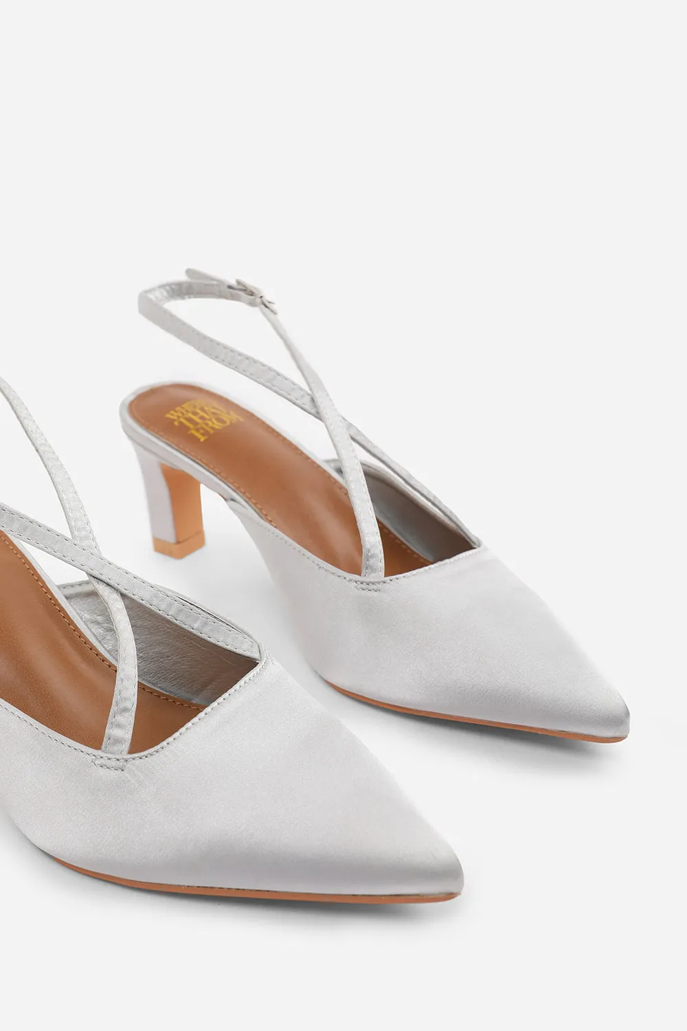 SERNA WIDE FIT POINTED TOE LOW BLOCK HEEL WITH CROSS OVER ANKLE STRAP IN SILVER SATIN